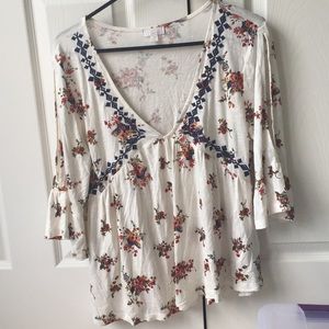 Charming Charlie’s top with floral, deep v scoop